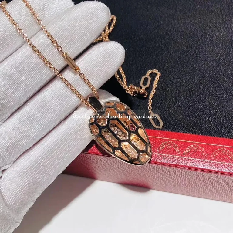 Bulgari Serpenti 352725 necklace in 18 kt rose gold set with rubellite eyes and with pavé diamonds