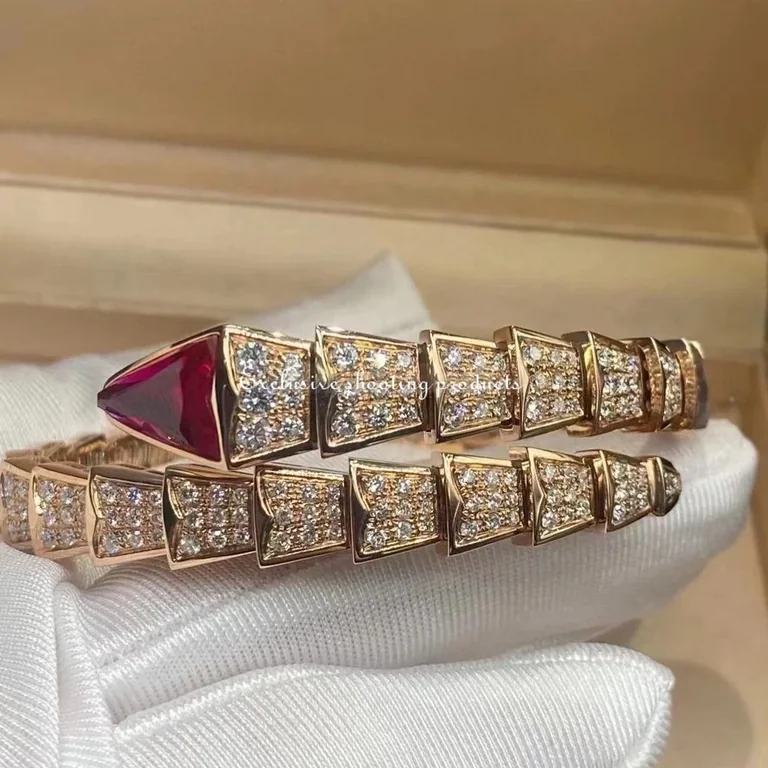 Bulgari 347602 Serpenti one-coil bracelet in 18 kt rose gold set with full pavé diamonds and a rubellite on the head 13