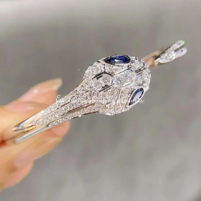 Bulgari Serpenti 354098 bangle bracelet in 18 kt white gold set with blue sapphire eyes and pavé diamonds 9