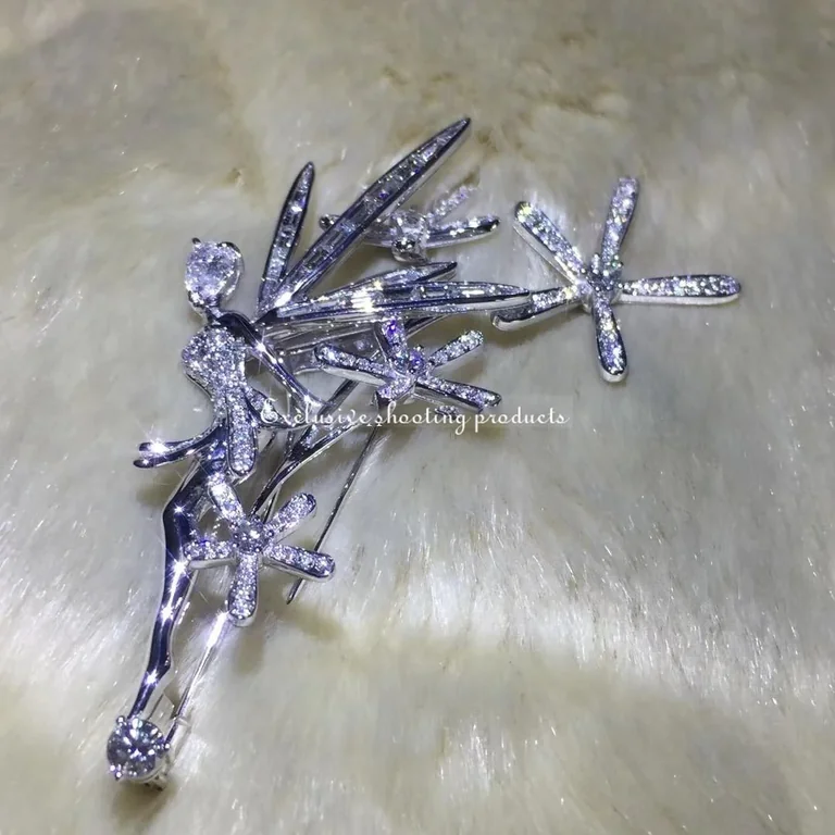 Van Cleef & Arpels clip Caresse d?Eole white gold dia fairy clip 4