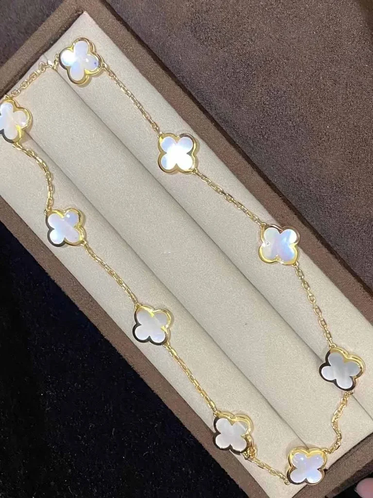 Van Cleef & Arpels VCARA37800 Pure Alhambra necklace 9 motifs Yellow gold Mother-of-pearl 4