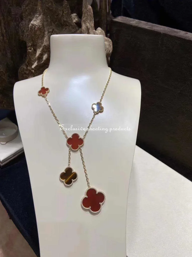 Van Cleef & Arpels VCARN5JP00 Magic Alhambra necklace 6 motifs Yellow gold Carnelian Tiger Eye necklace 8