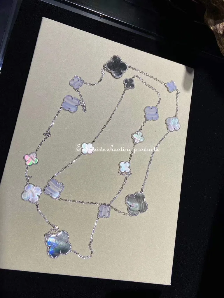 Van Cleef & Arpels VCARN19000 Magic Alhambra long necklace 16 motifs White gold Chalcedony Mother-of-pearl necklace 4