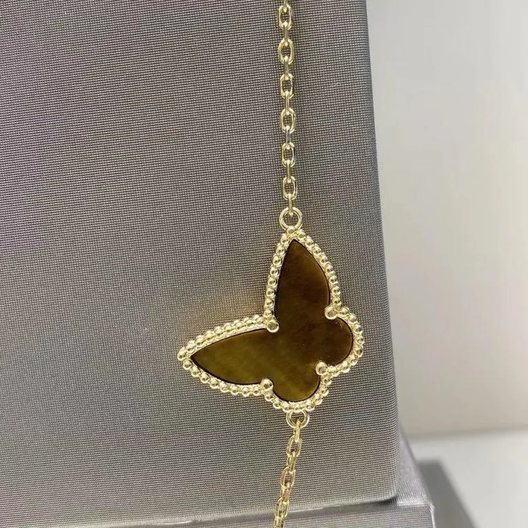 Van Cleef & Arpels VCARD80100 Lucky Alhambra long necklace 12 motifs Yellow gold Carnelian Malachite Mother-of-pearl Tiger Eye 13