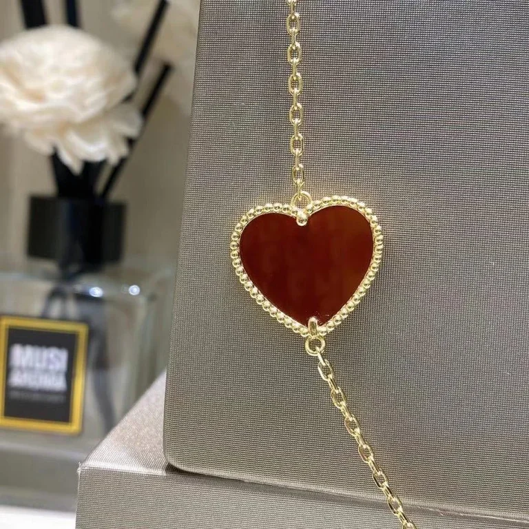 Van Cleef & Arpels VCARD80100 Lucky Alhambra long necklace 12 motifs Yellow gold Carnelian Malachite Mother-of-pearl Tiger Eye 12