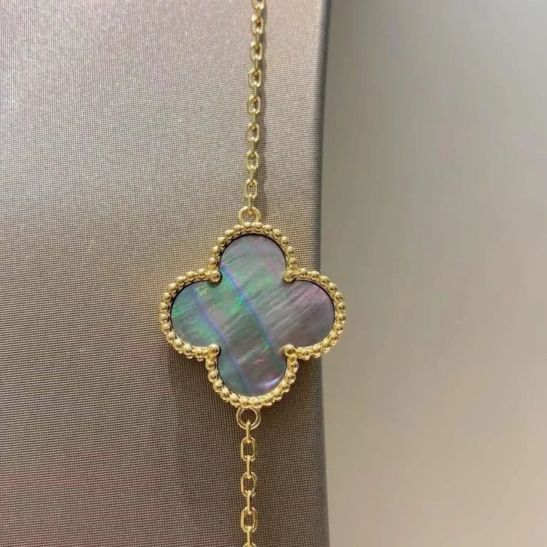 Van Cleef & Arpels VCARD80100 Lucky Alhambra long necklace 12 motifs Yellow gold Carnelian Malachite Mother-of-pearl Tiger Eye 11