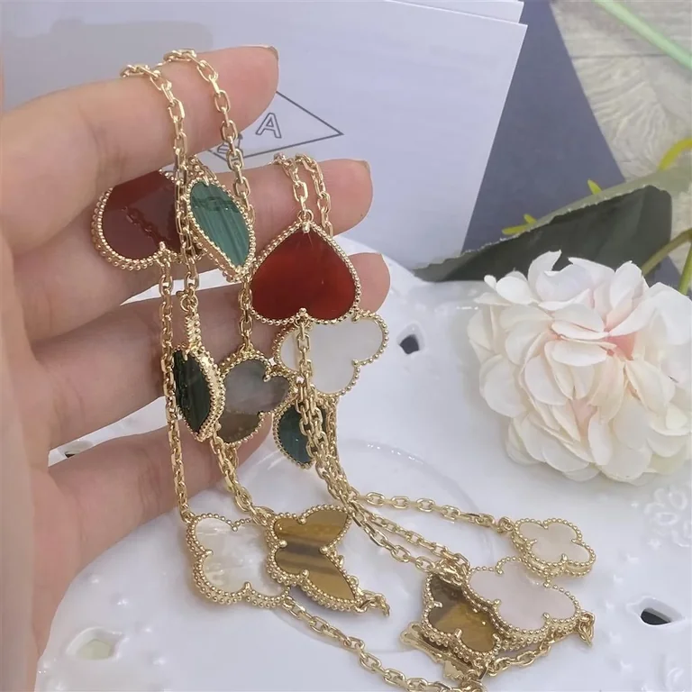 Van Cleef & Arpels VCARD80100 Lucky Alhambra long necklace 12 motifs Yellow gold Carnelian Malachite Mother-of-pearl Tiger Eye 7