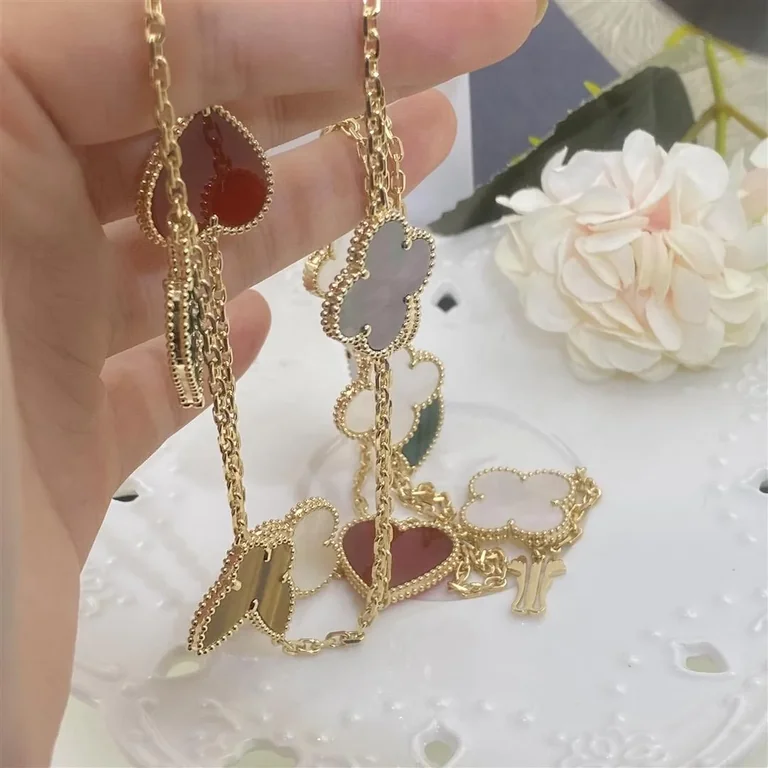 Van Cleef & Arpels VCARD80100 Lucky Alhambra long necklace 12 motifs Yellow gold Carnelian Malachite Mother-of-pearl Tiger Eye 6