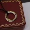 Cartier Trinity Pave Diamond Pendant On A Cord Necklace Coral 4