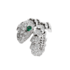 Bulgari Serpenti 354697 18 kt white gold ring set with pavé diamonds and two emerald eyes 1