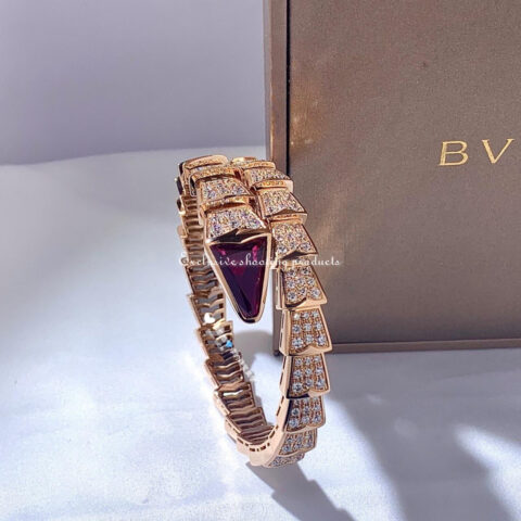 Bulgari 347602 Serpenti one-coil bracelet in 18 kt rose gold set with full pavé diamonds and a rubellite on the head 17