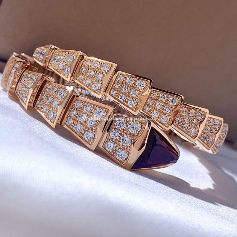 Bulgari 347602 Serpenti one-coil bracelet in 18 kt rose gold set with full pavé diamonds and a rubellite on the head 16